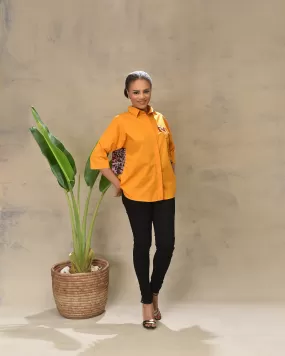 Aimas Namke orange Shirt with Gele image and Adire crepe back detail