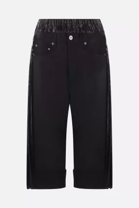 cropped pants in twill and shiny pleated nylon